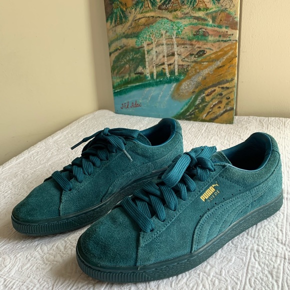 teal suede pumas